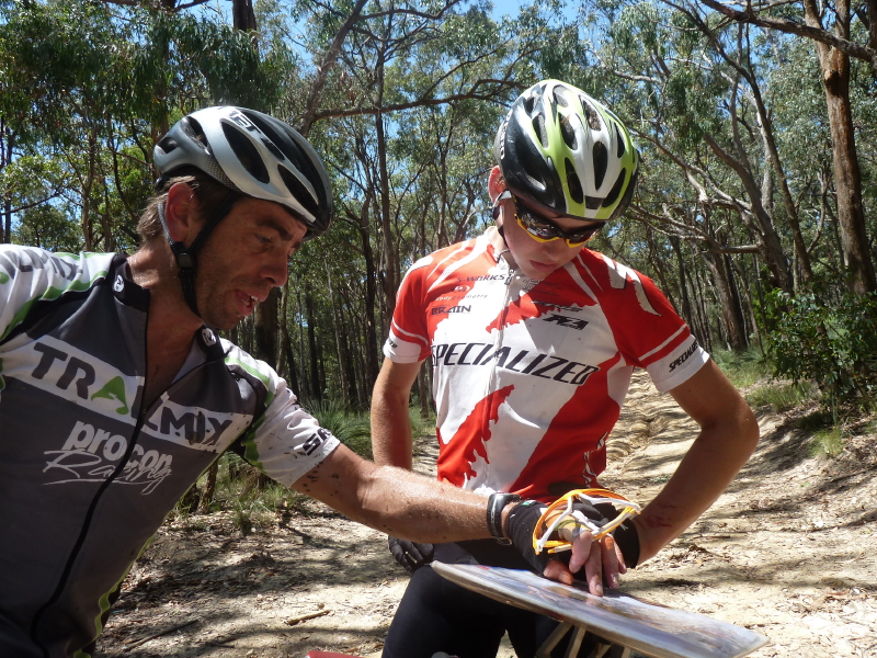 Alex Randall giving some tips to junior Marc Gluskie